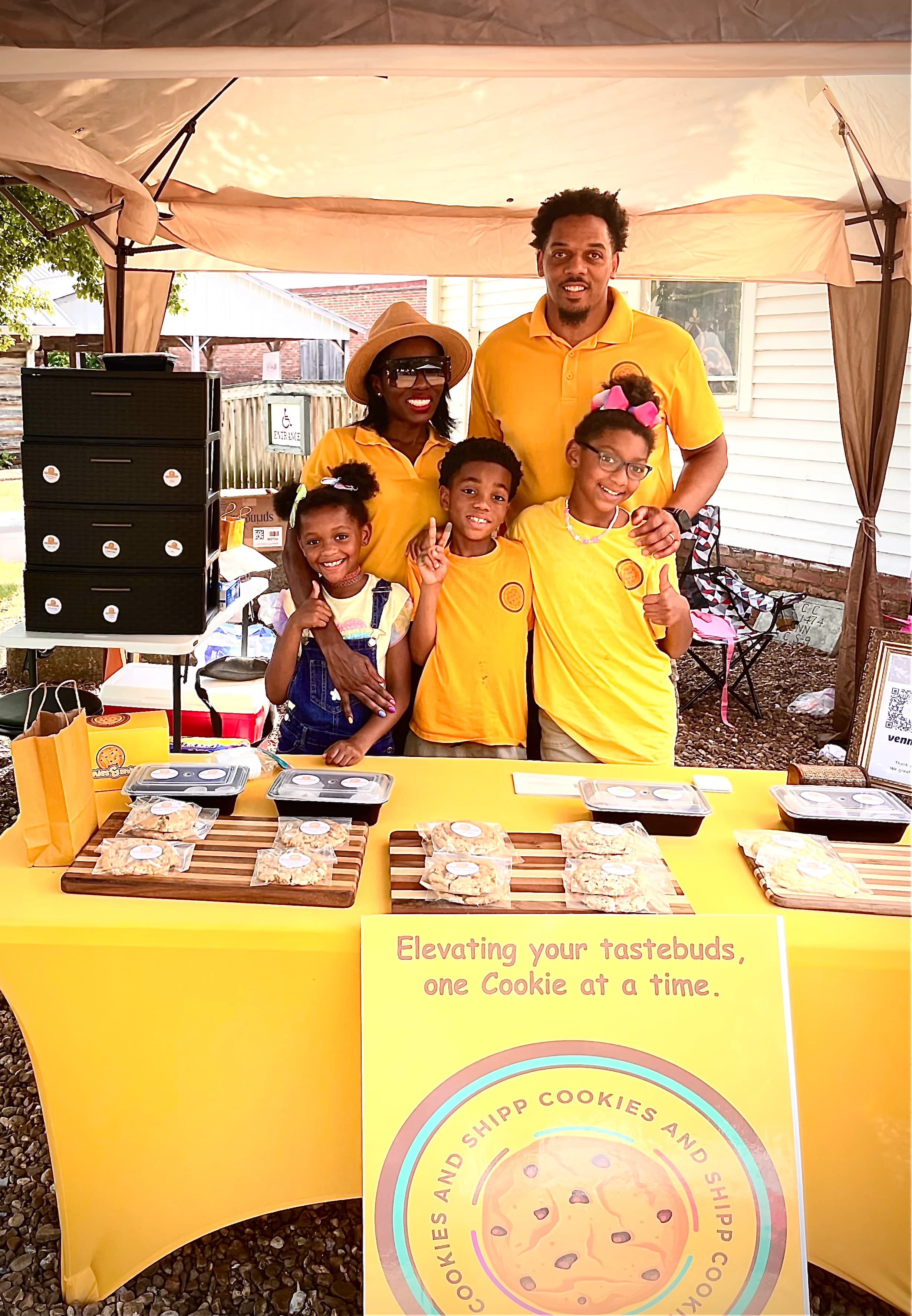 Thomas and Tamika Shipp at a Cookies and Shipp market booth